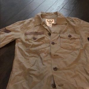 TNA button up top